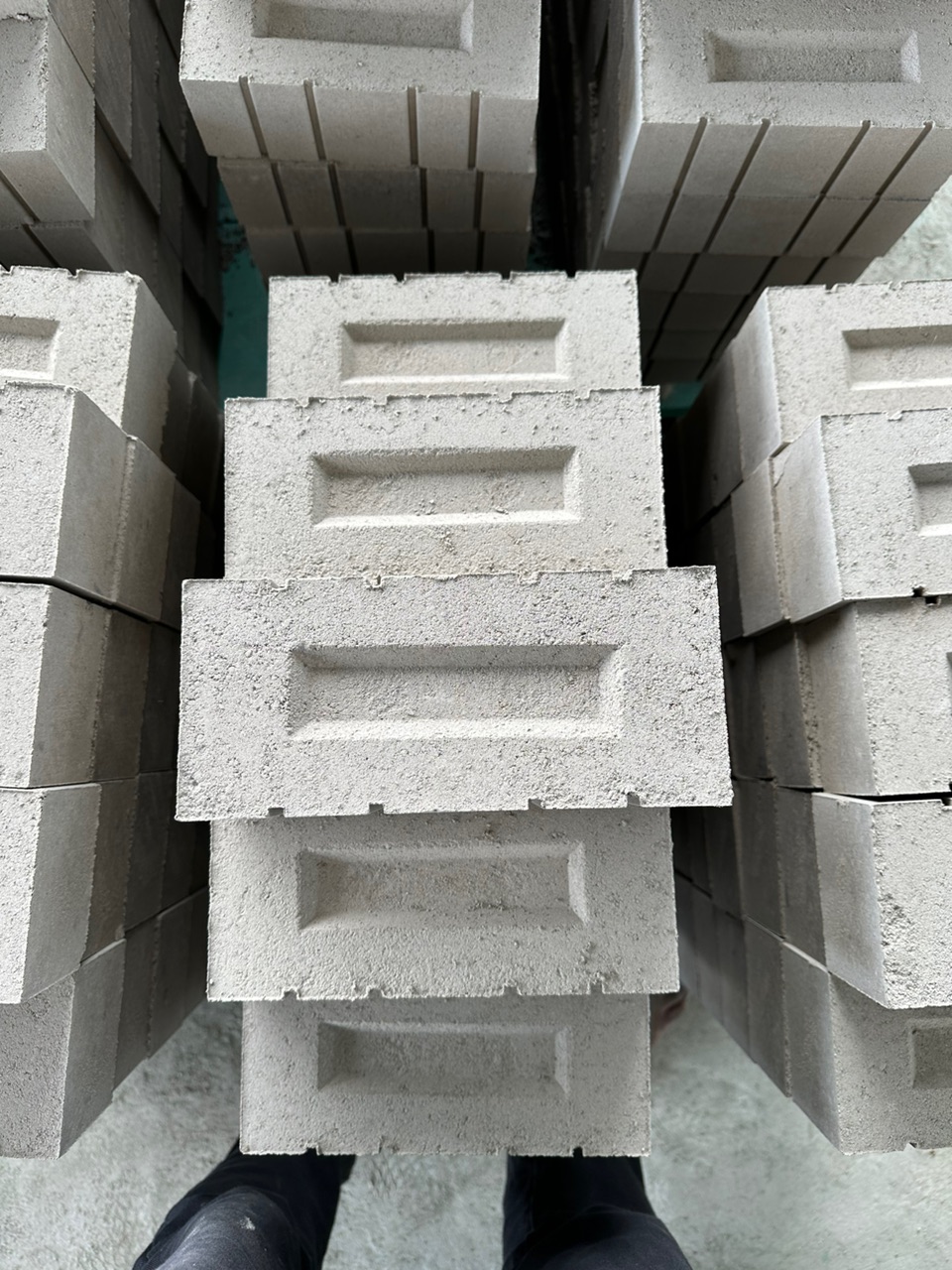 PMM fly ash bricks stacked at the yard